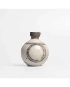 Handmade sustainable eco-friendly organic artisan made raku fired vase by Rakhee Kane. Made in Aavartan studio, Auroville